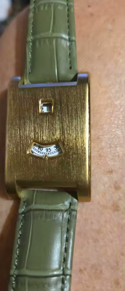 The Dolcevita Olive Gold Watch