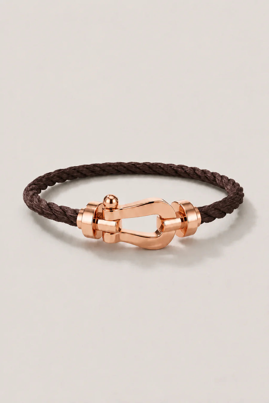 Le bracelet Riviera or rose marron foncé
