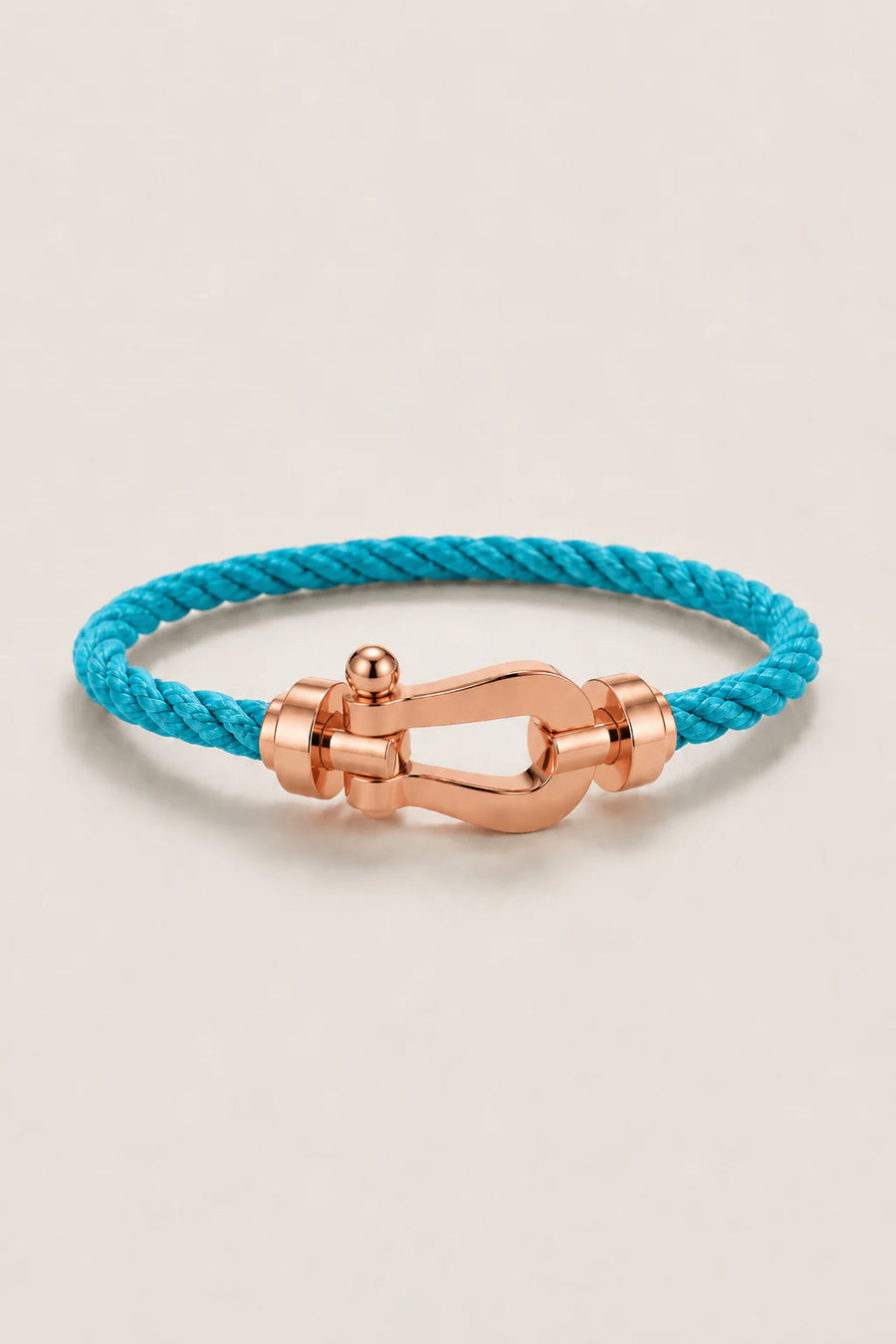 Le bracelet Riviera Light Blue Rose Gold